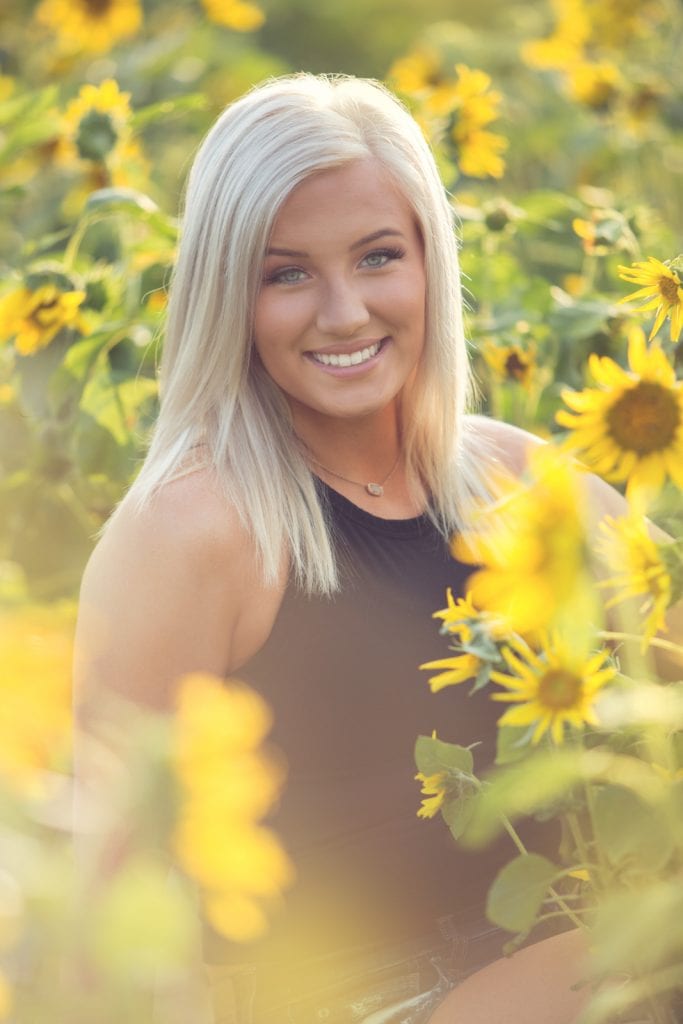 senior pictures in sunflowers 